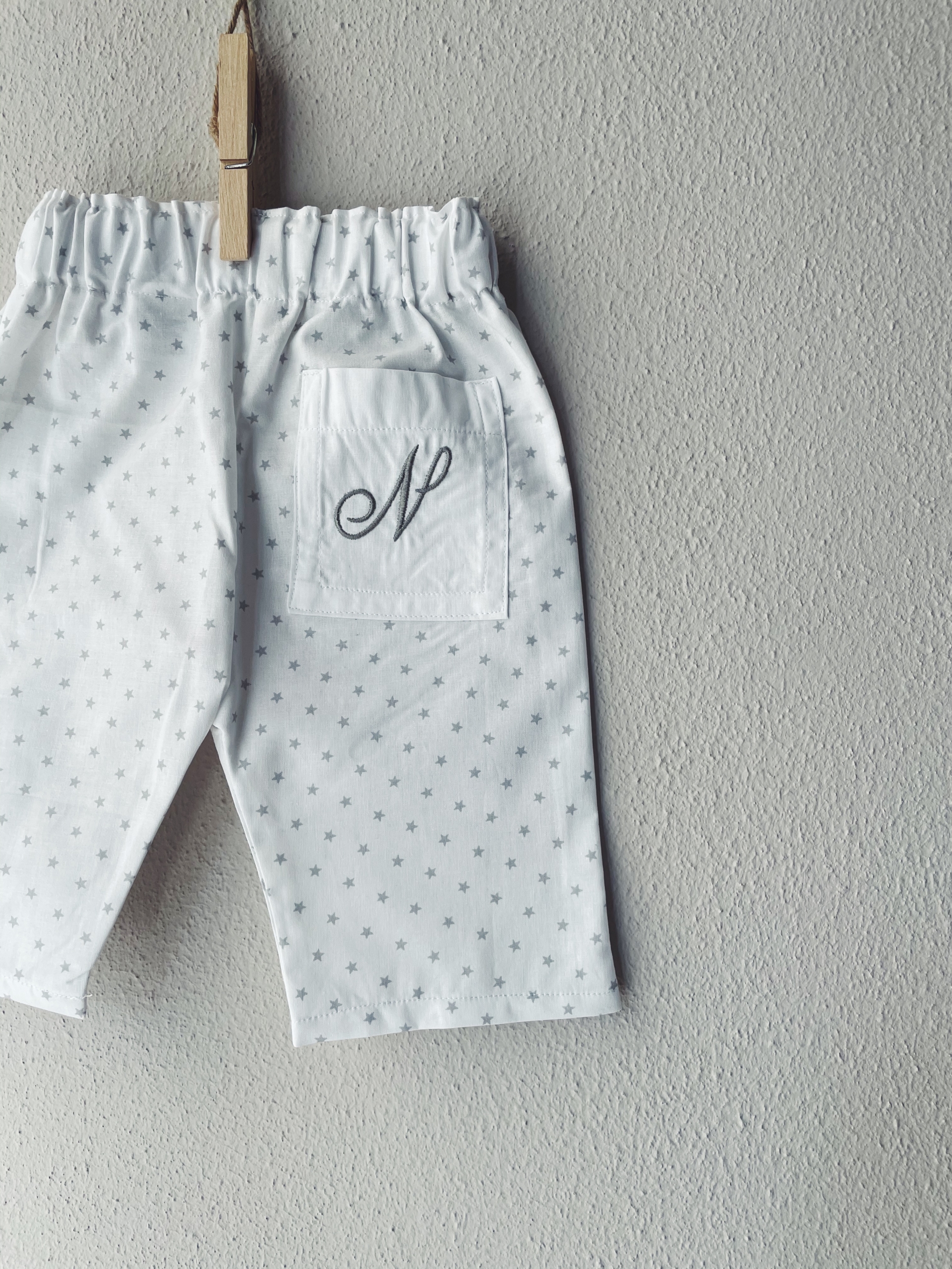 PANTALONE IN COTONE FANTASIA CON TASCA RICAMATA