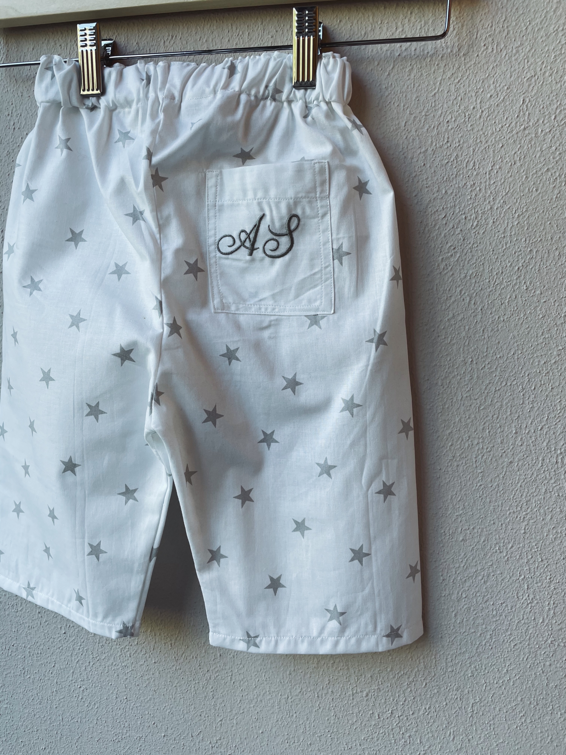 PANTALONE IN COTONE FANTASIA CON TASCA RICAMATA