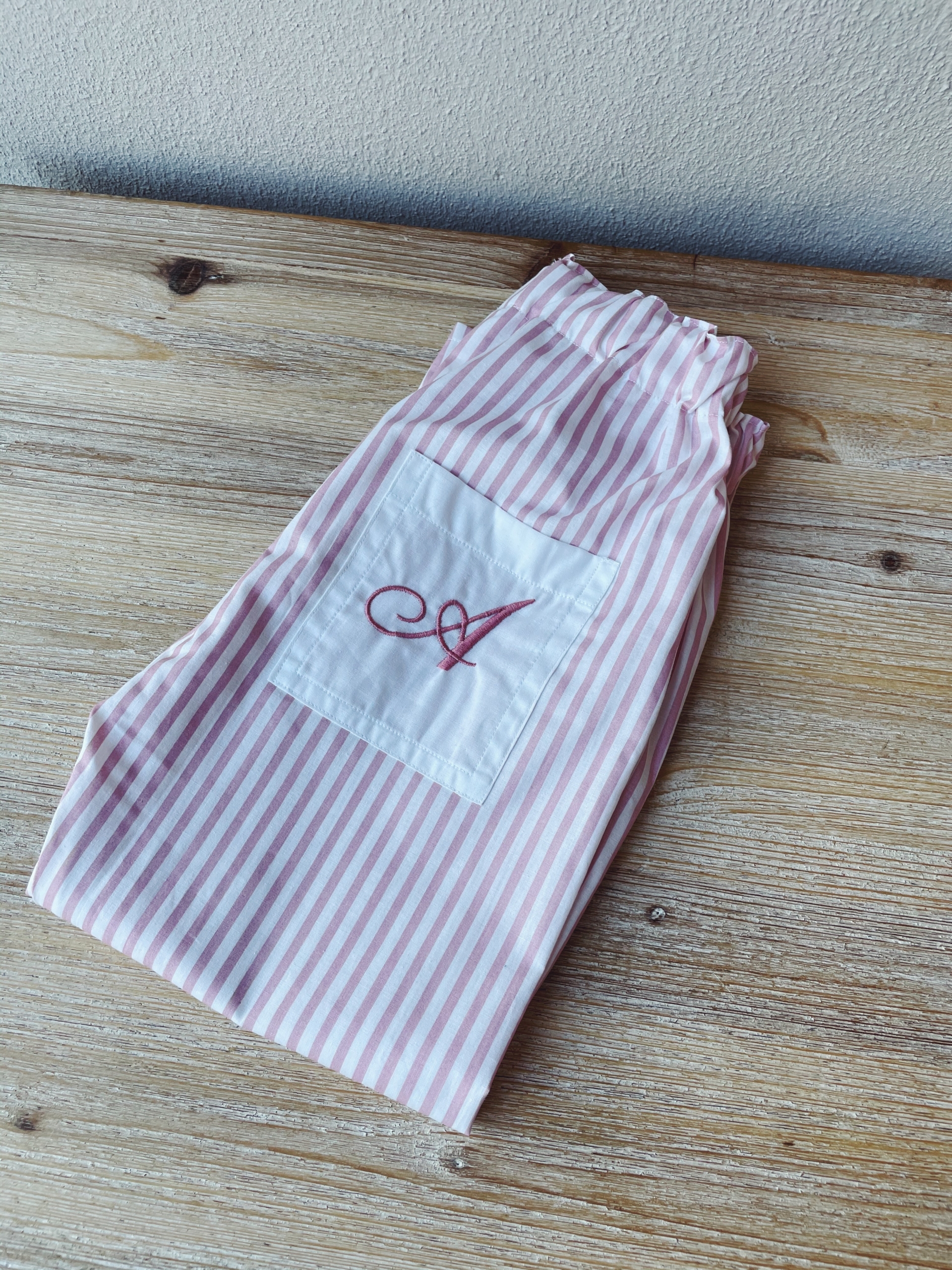 PANTALONE IN COTONE FANTASIA CON TASCA RICAMATA