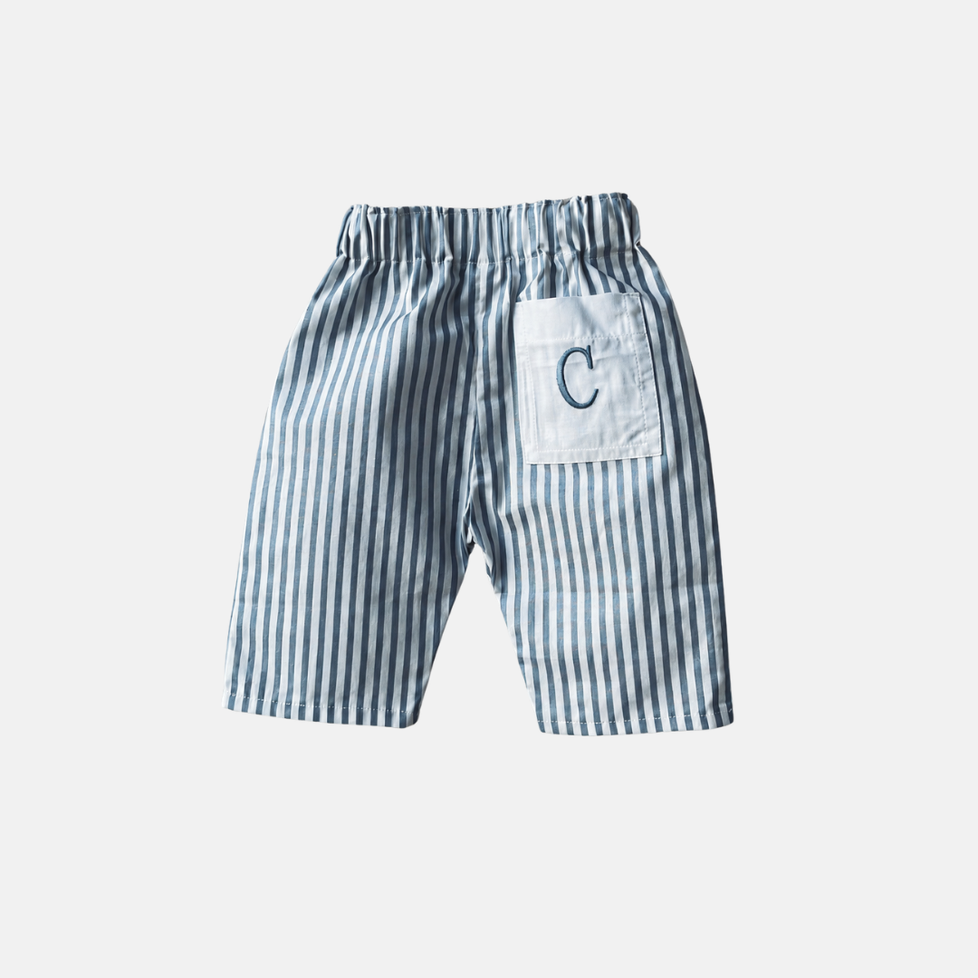 PANTALONE IN COTONE FANTASIA CON TASCA RICAMATA